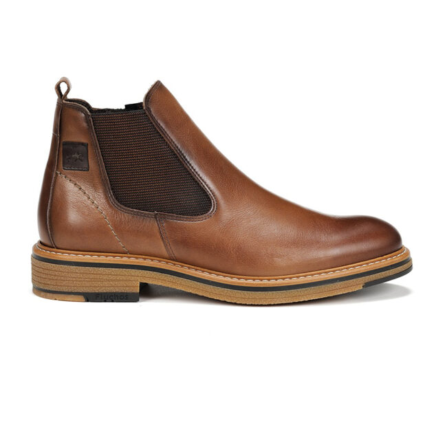 Botín para hombre Fluchos Kasper F1817, con diseño semi informal y elásticos laterales para un calce fácil. Combina tecnología y tradición, siendo el complemento ideal para elevar cualquier look con comodidad durante todo el día.