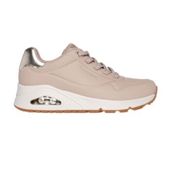 Zapatillas de mujer Skechers Uno Shimmer Away, con plantilla Skechers Air-Cooled Memory Foam® y media suela con cámara de aire Skech-Air®. Diseñadas con parte superior de durabuck sintético y ribete metalizado, combinan estilo moderno y confort.