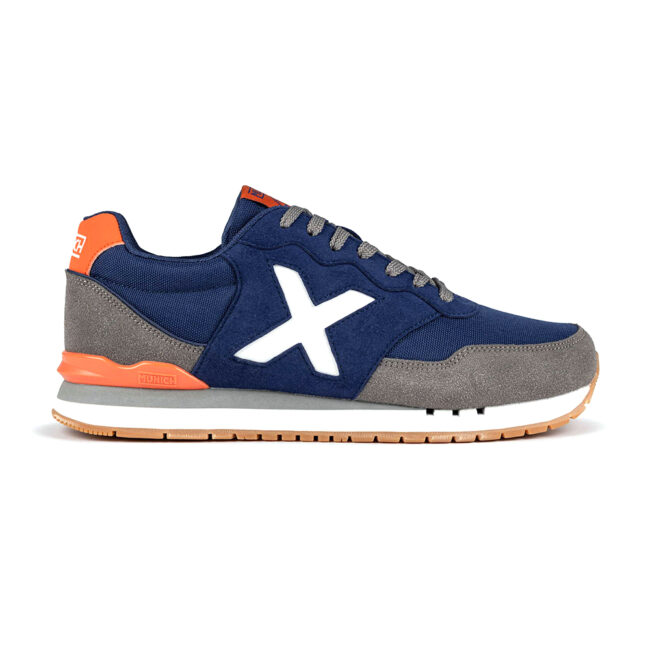 Zapatillas Munich Dash 227 para hombre en azul marino, con un diseño retro running inspirado en los clásicos de Munich. Perfectas para un look casual y urbano que destaca por su estilo atemporal.